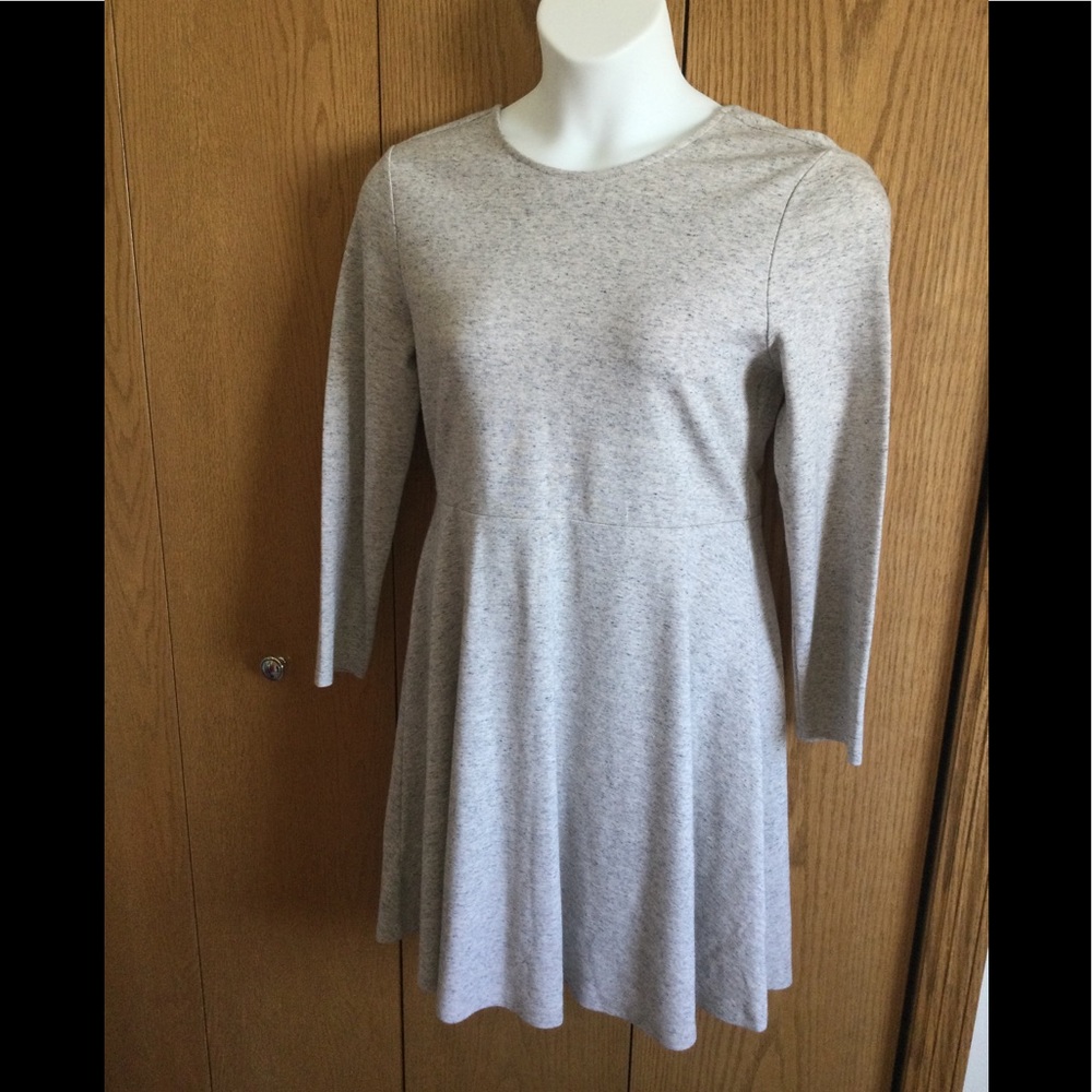 New without tags. Comfortable, stretchy ,knit dress. Cross back design.
